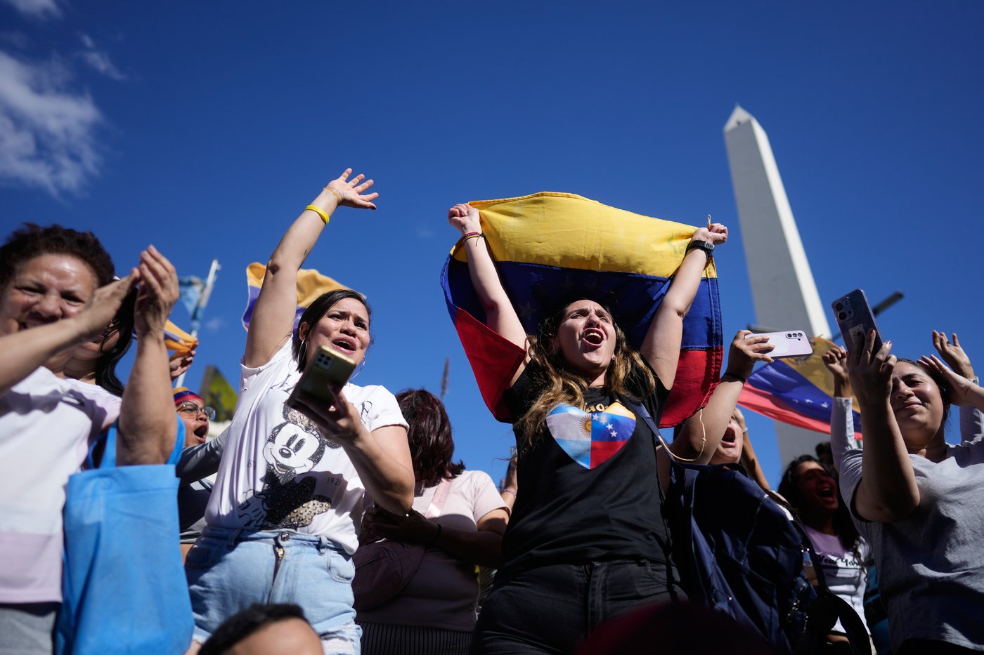 Photos show people reacting to the US capture of Venezuelan President Nicolas Maduro | iNFOnews.ca