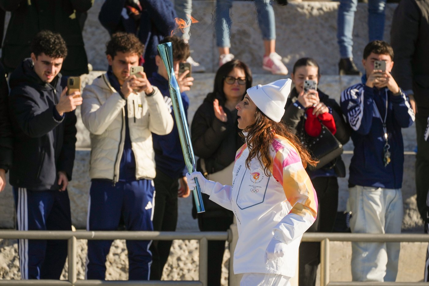 Summer Olympians begin torch relay for Milan Cortina Winter Games on 2-month countdown | iNFOnews.ca