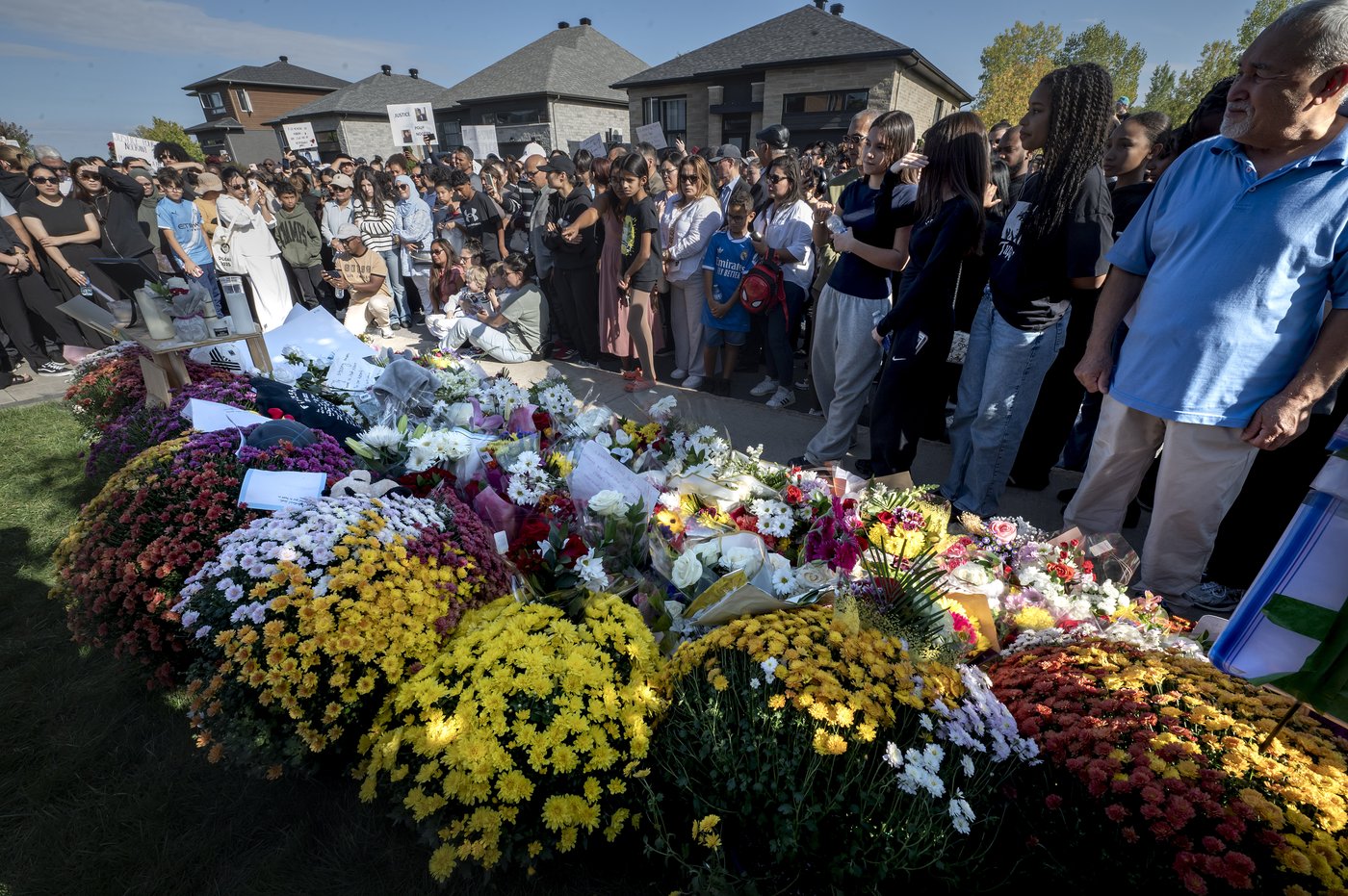 'Devastated:' Family, friends hold vigil for 15-year-old boy fatally shot by police | iNFOnews.ca