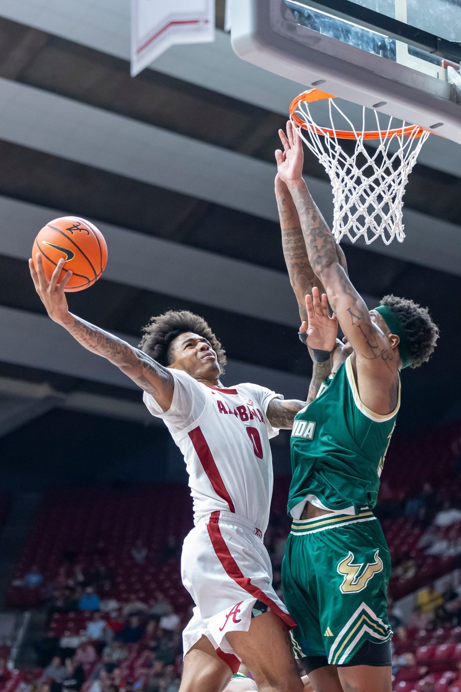 Labaron Philon, Aden Holloway power No. 16 Alabama past South Florida 104-93 | iNFOnews.ca