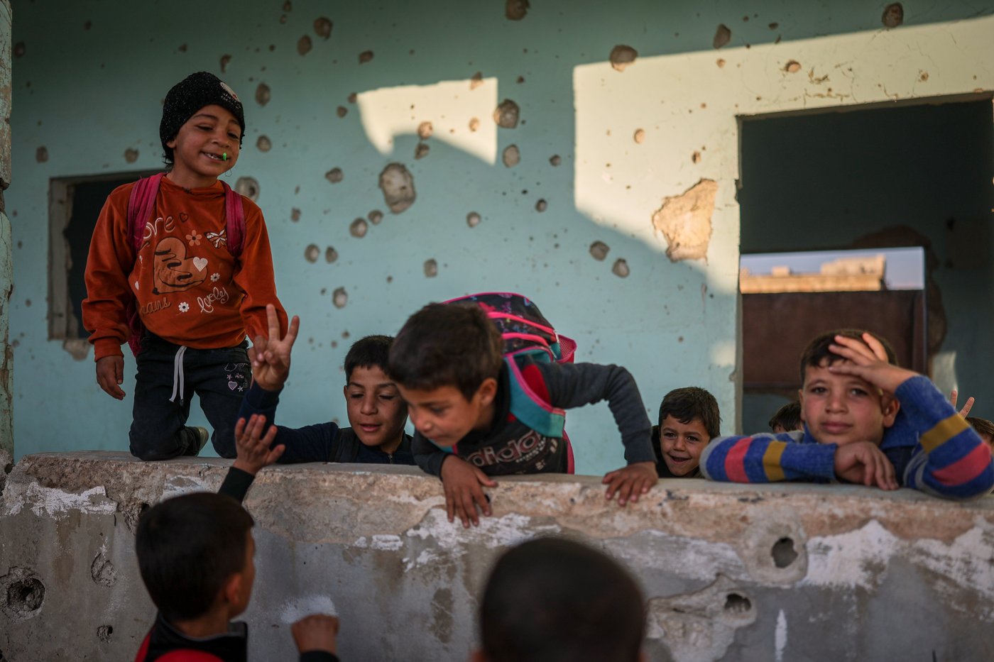 Photos show Syrian students returning to schools stripped bare by conflict | iNFOnews.ca