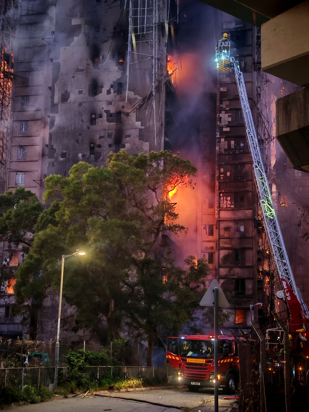 Grateful to be alive, residents who escaped the Hong Kong apartment blaze wonder what comes next | iNFOnews.ca