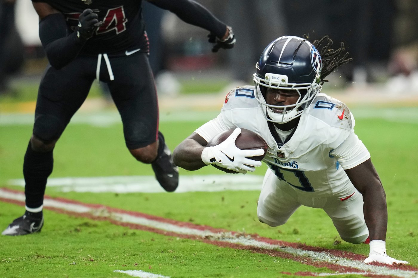 Titans snap 10-game skid with improbable comeback to beat Cardinals 22-21 | iNFOnews.ca