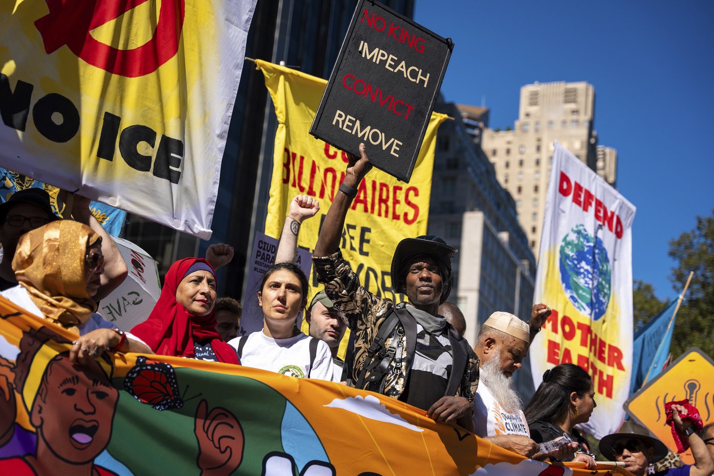 Photos show activists targeting billionaires in a street protest on the eve of New York Climate Week | iNFOnews.ca
