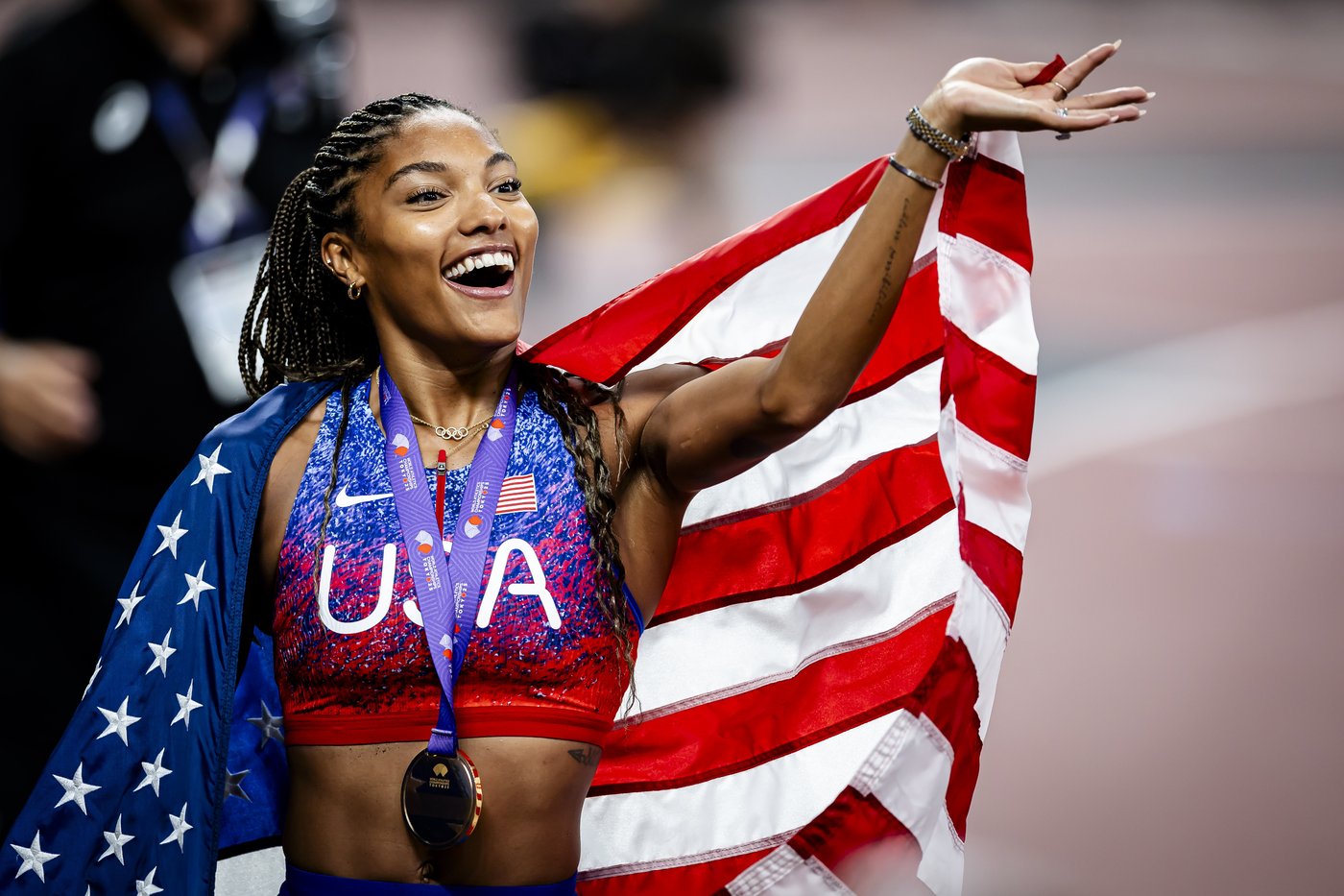 Long jumper Tara Davis-Woodhall explains tears during national anthem: 'I do believe in my country' | iNFOnews.ca