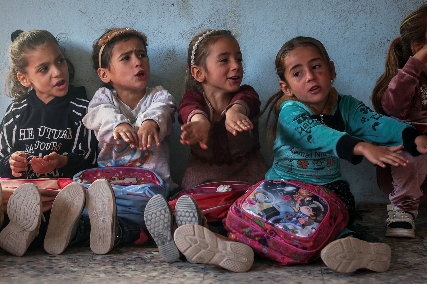 Photos show Syrian students returning to schools stripped bare by conflict | iNFOnews.ca