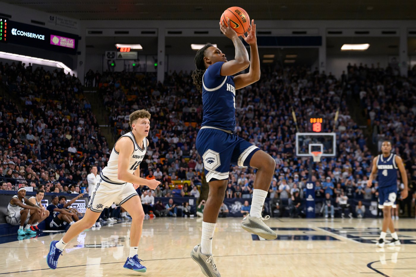 Mason Falslev scores 26 points to help No. 23 Utah State beat Nevada 71-62 | iNFOnews.ca