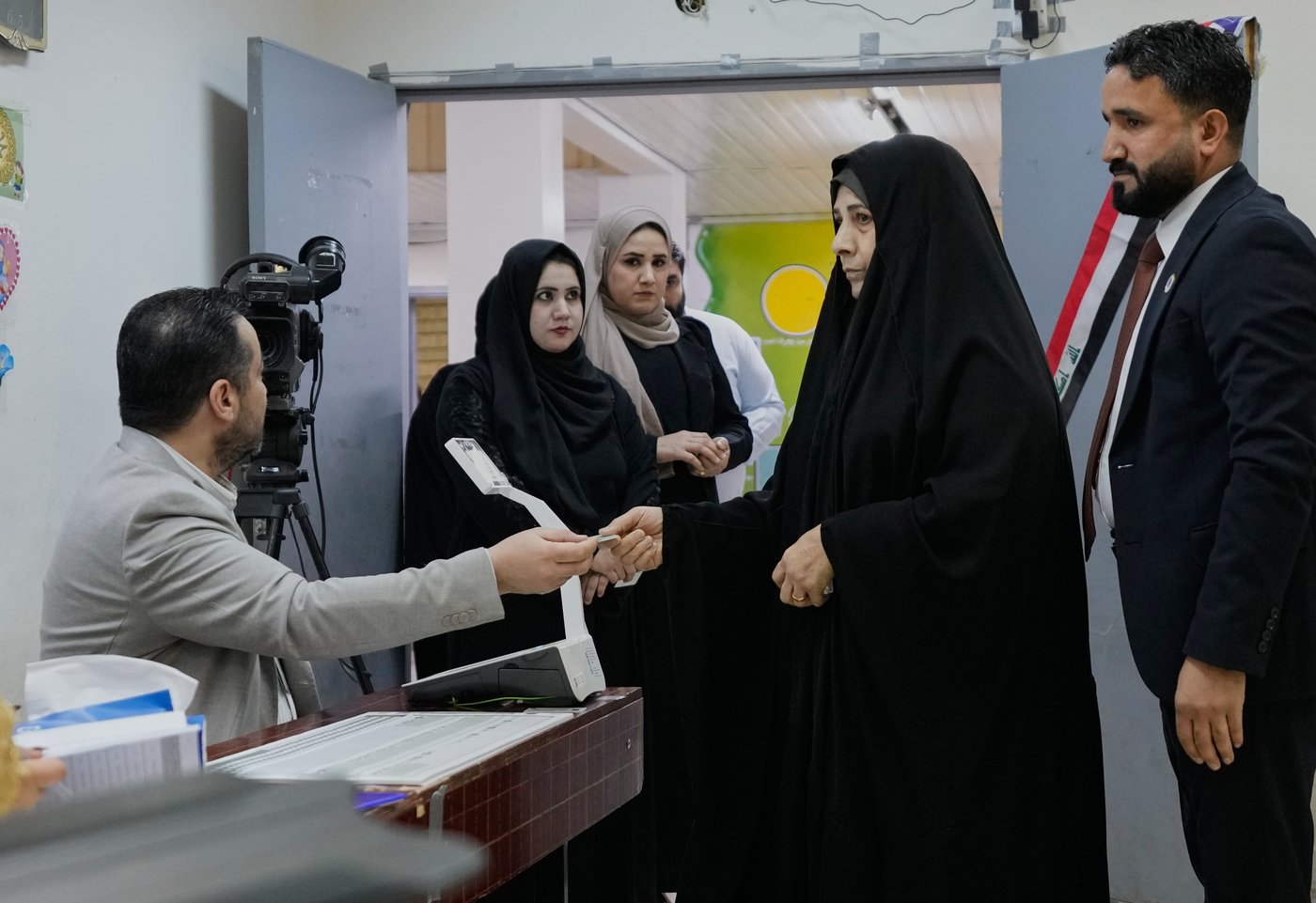 Iraqis vote in a parliamentary election marked by tight security and a major political boycott | iNFOnews.ca