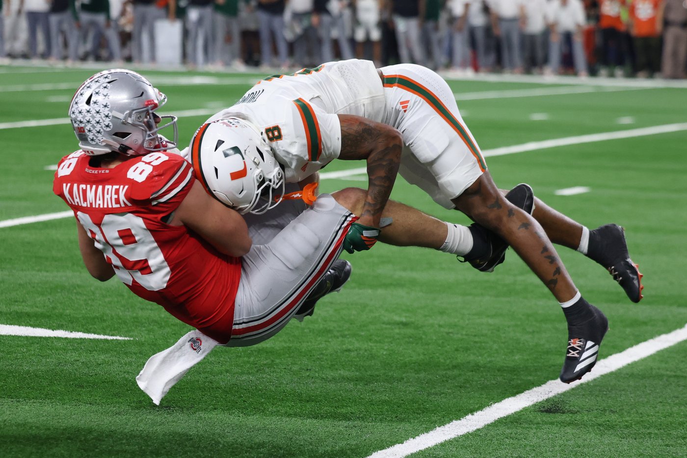 Miami beats defending national champ Ohio State 24-14 in the CFP quarterfinal at Cotton Bowl | iNFOnews.ca