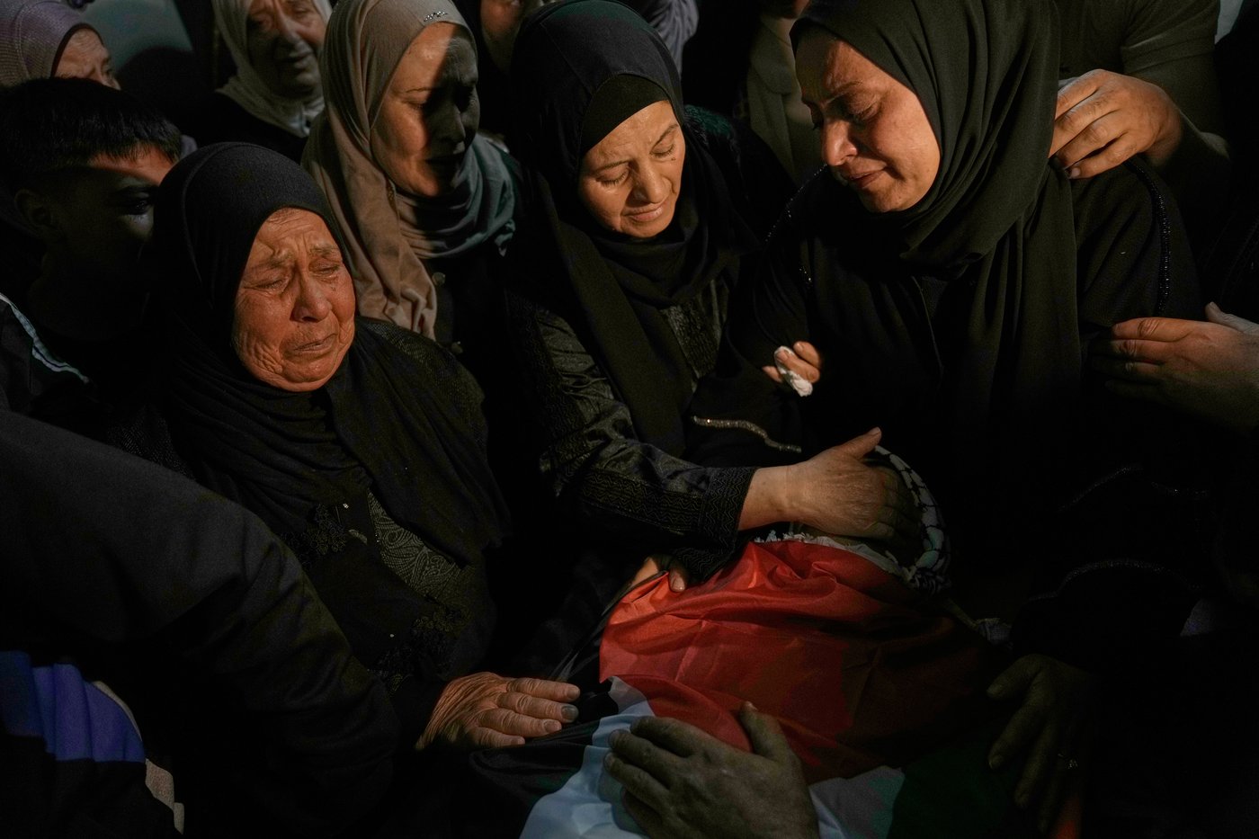 Israel hands over bodies of 45 Palestinians after Hamas returns the remains of 3 soldiers | iNFOnews.ca Israel hands over bodies of 45 Palestinians after Hamas returns the remains of 3 soldiers | iNFOnews.ca