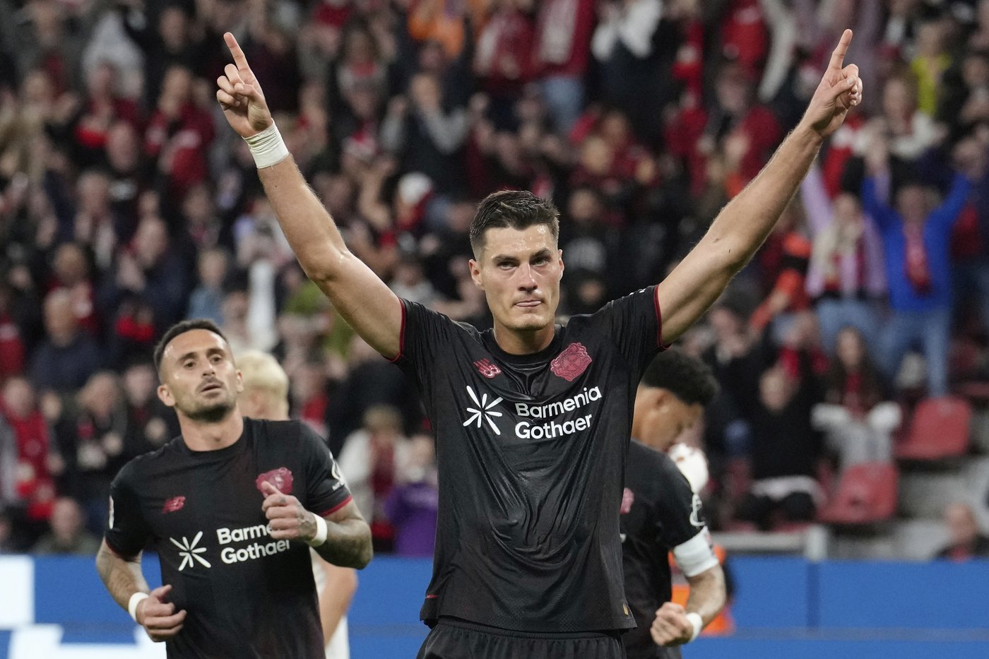 Leverkusen fights past in-form Frankfurt to earn first Bundesliga win | iNFOnews.ca