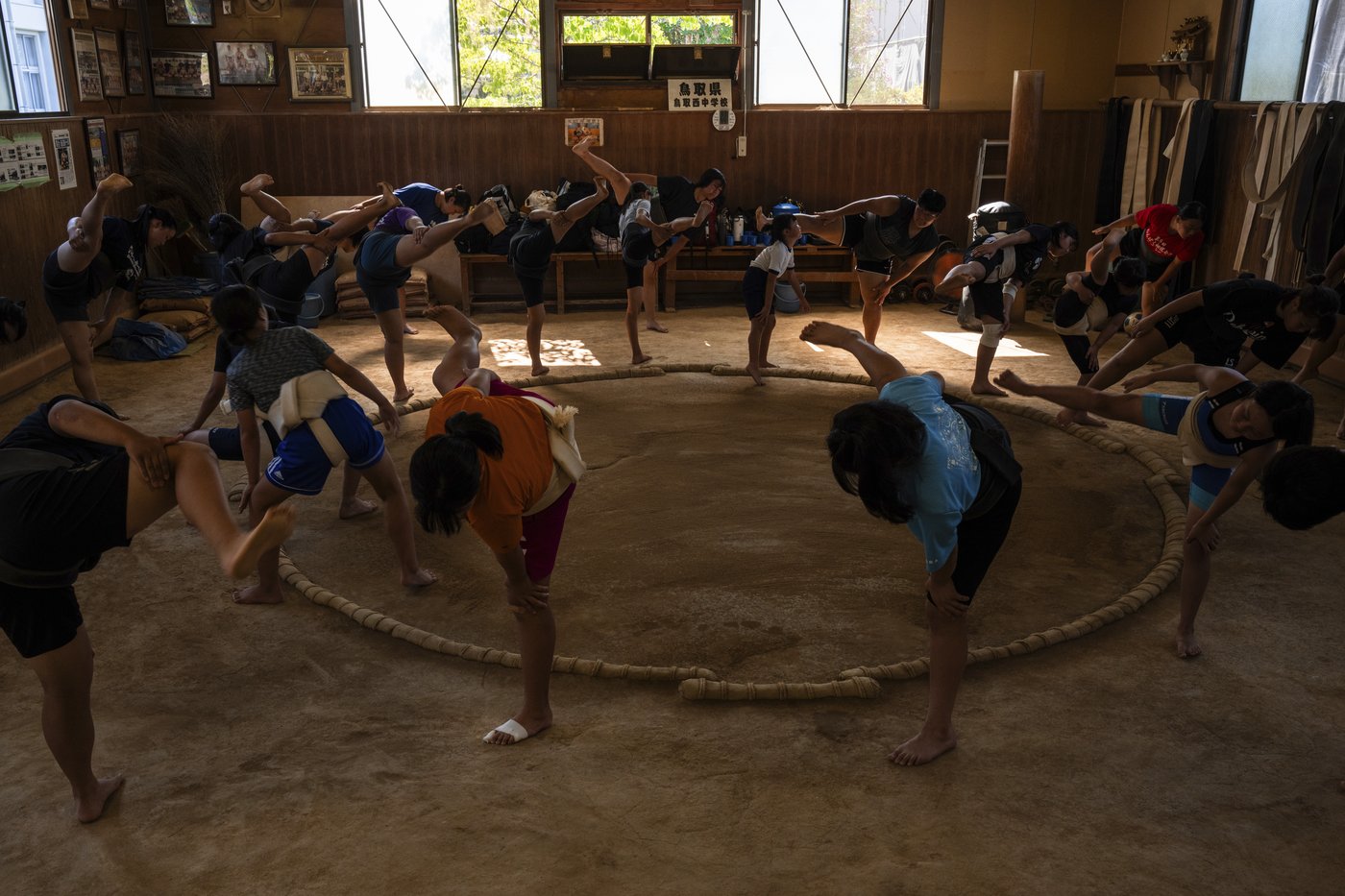 Photos show women in Japan working to break down barriers in ancient, tradition-bound sumo | iNFOnews.ca