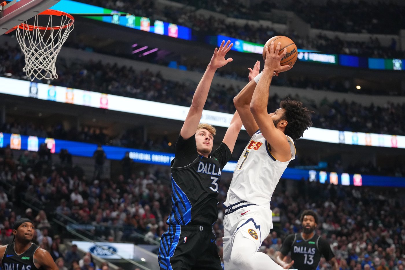 Cooper Flagg sprains an ankle and is ruled out after halftime as Mavs lose to Nuggets | iNFOnews.ca