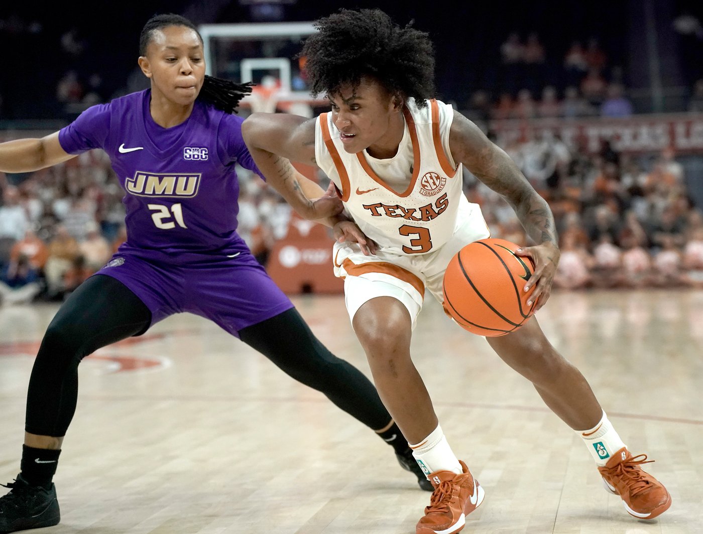 Booker's all-around performance leads No. 4 Texas to a 95-56 win against James Madison | iNFOnews.ca