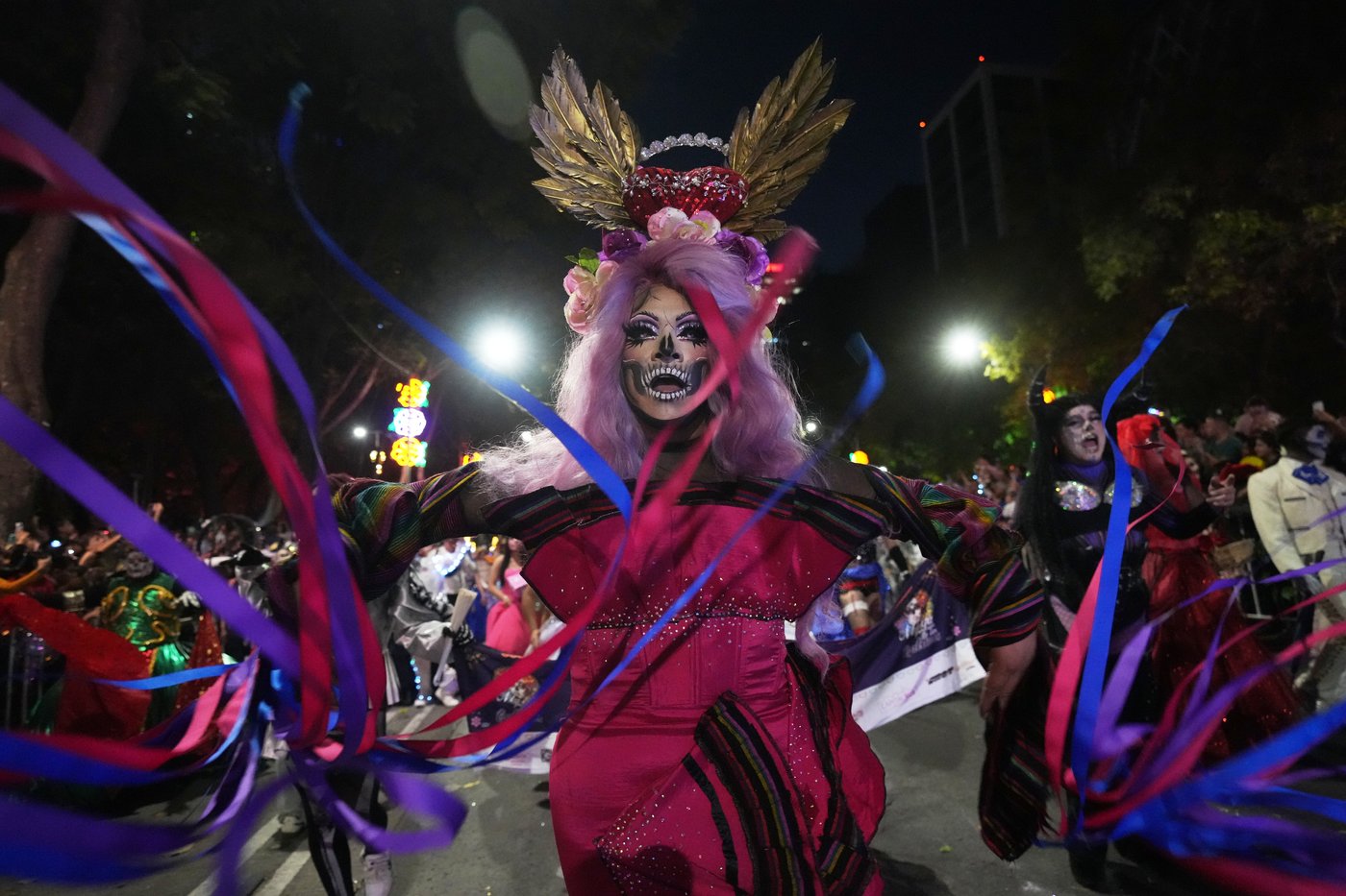 LGBTQ+ artists bring pride to Mexico City's Catrina parade ahead of Day of the Dead, in photos | iNFOnews.ca