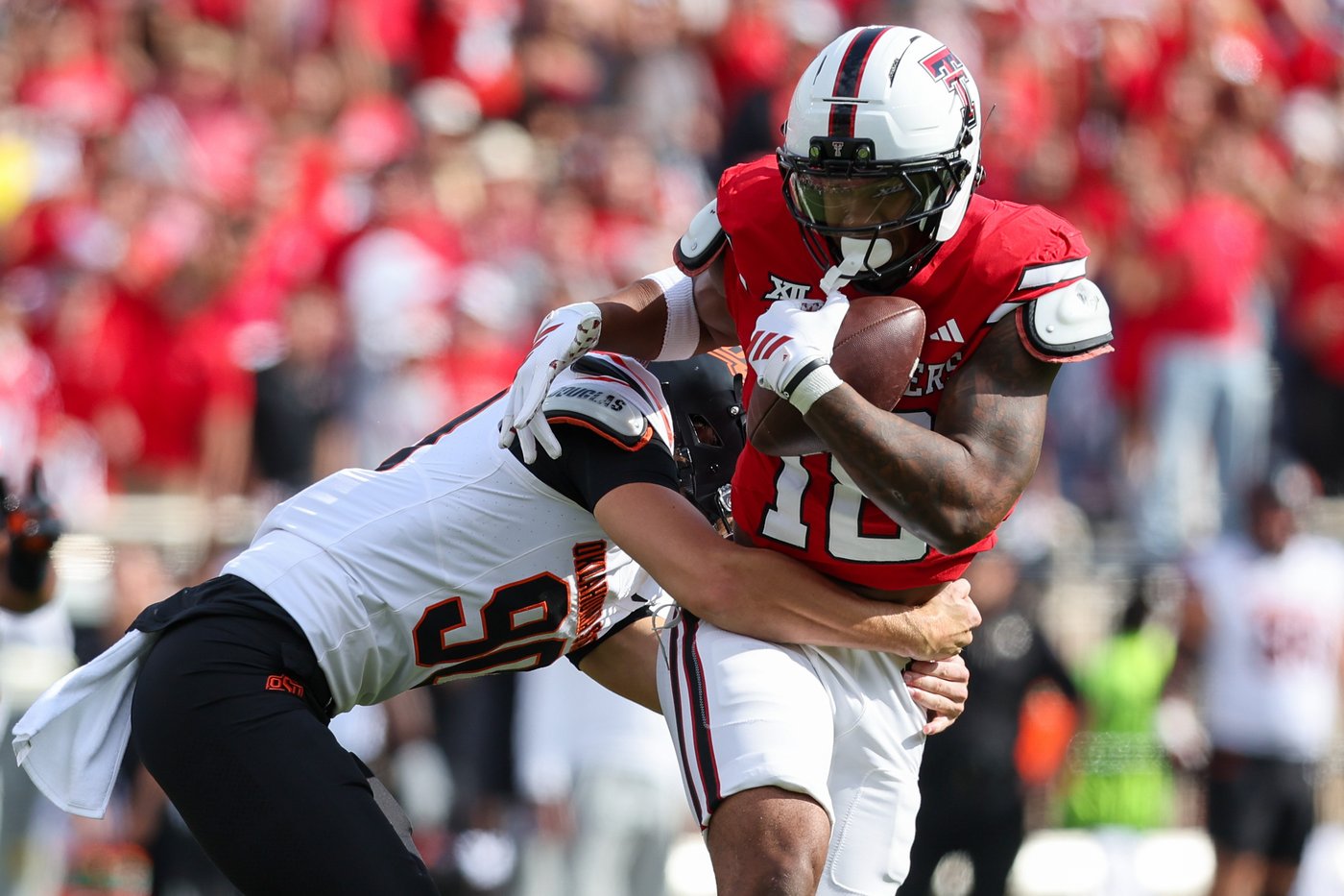 J'Koby Williams scores twice right away as No. 14 Texas Tech routs Oklahoma State 42-0 | iNFOnews.ca J'Koby Williams scores twice right away as No. 14 Texas Tech routs Oklahoma State 42-0 | iNFOnews.ca