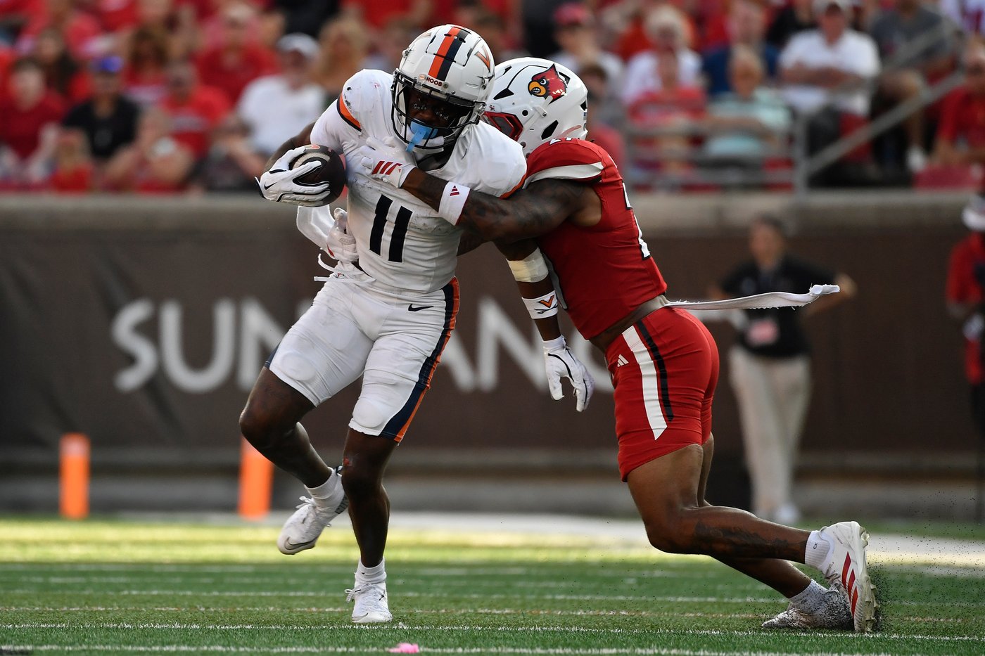 Taylor's OT run lifts No. 24 Virginia to a 30-27 victory over Louisville | iNFOnews.ca