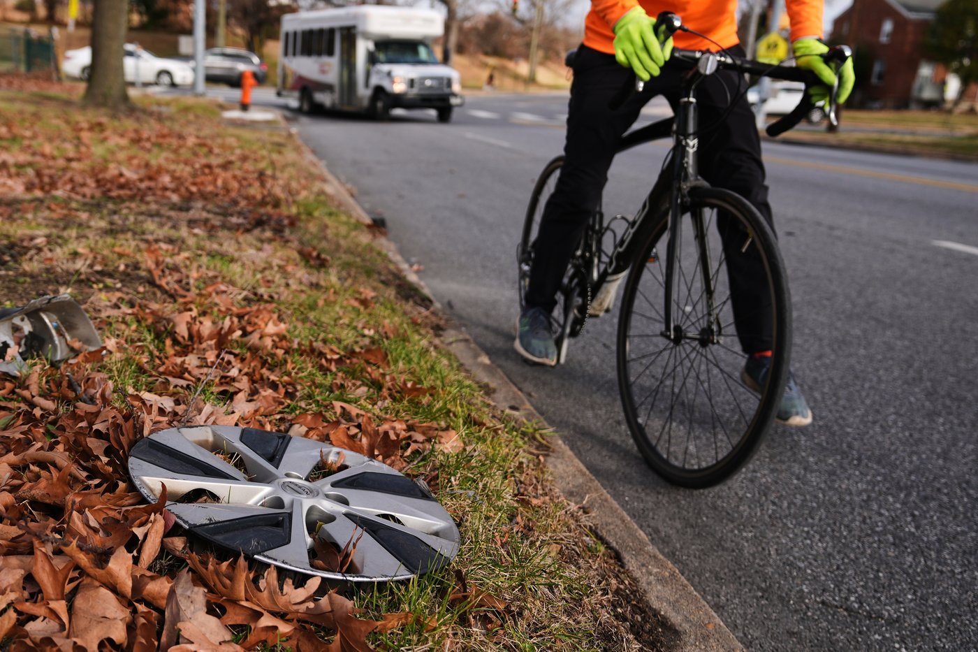 Baltimore cyclist finds joy in collecting lost hubcaps and stringing them into art | iNFOnews.ca