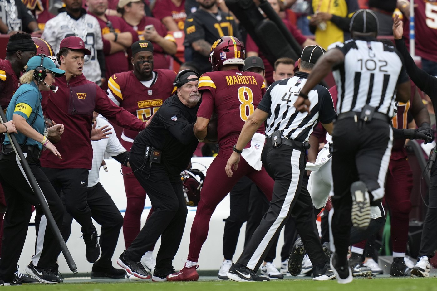 Commanders coach Dan Quinn bloodied in sideline collision with Marcus Mariota | iNFOnews.ca