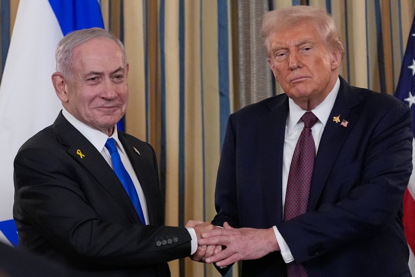 Trump signs an executive order vowing to defend Qatar in the wake of Israel's strike | iNFOnews.ca