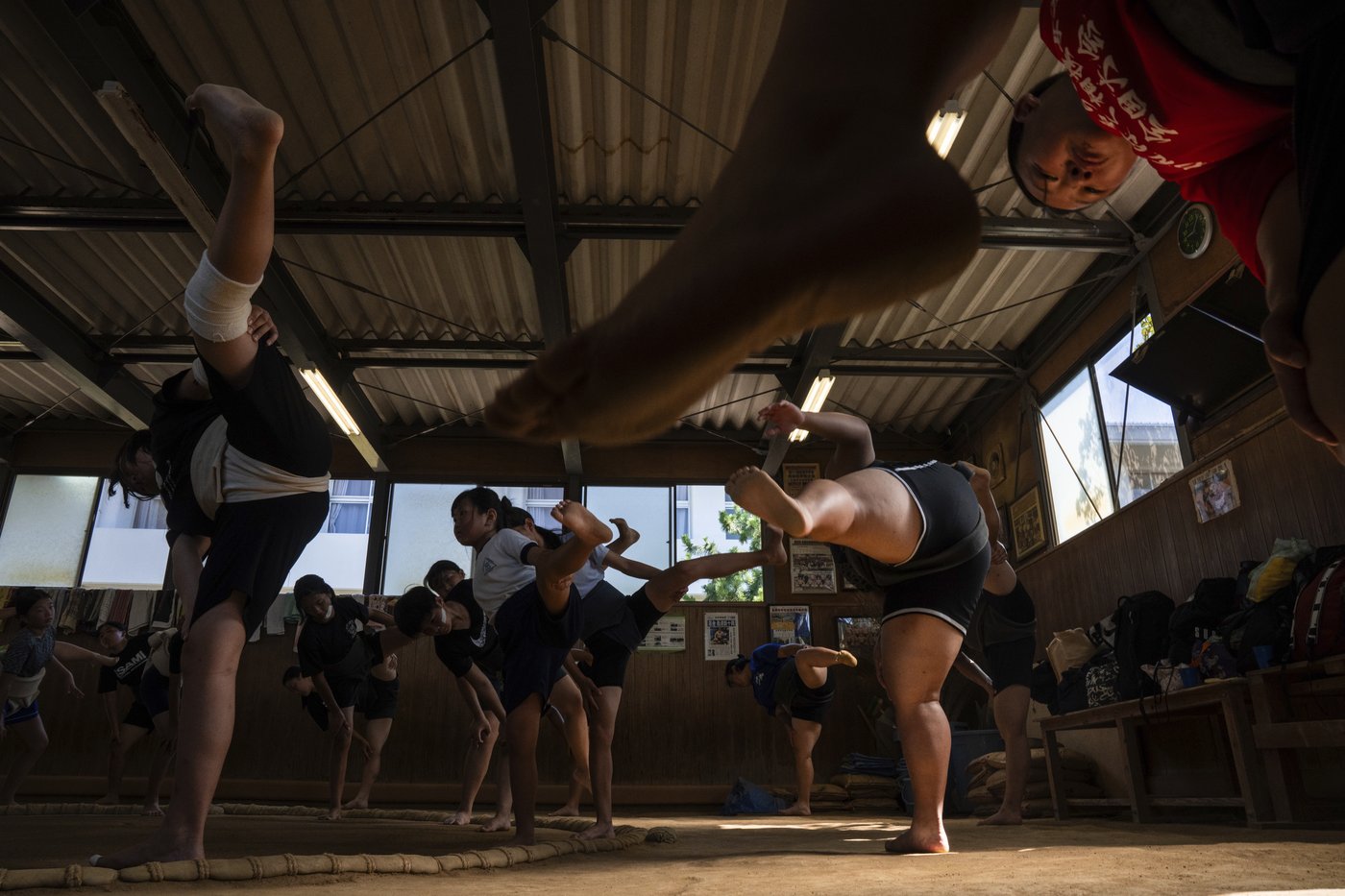 Photos show women in Japan working to break down barriers in ancient, tradition-bound sumo | iNFOnews.ca