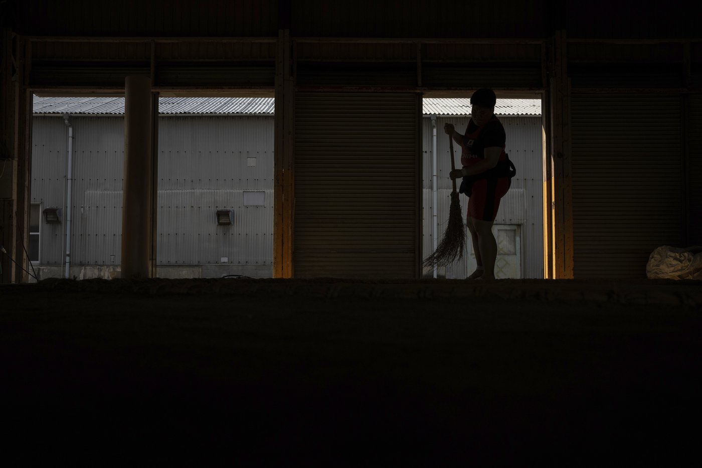 Photos show women in Japan working to break down barriers in ancient, tradition-bound sumo | iNFOnews.ca