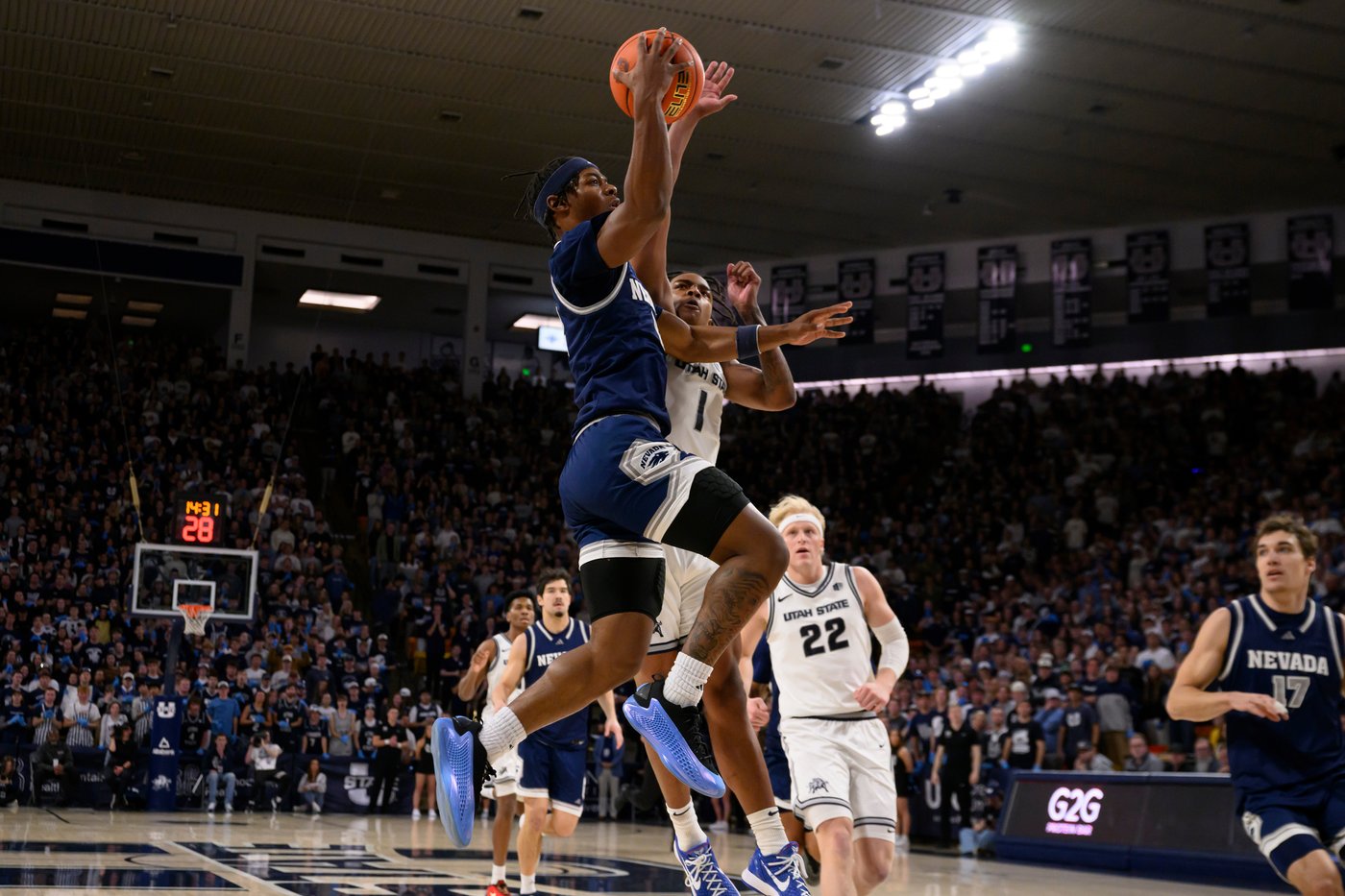 Mason Falslev scores 26 points to help No. 23 Utah State beat Nevada 71-62 | iNFOnews.ca