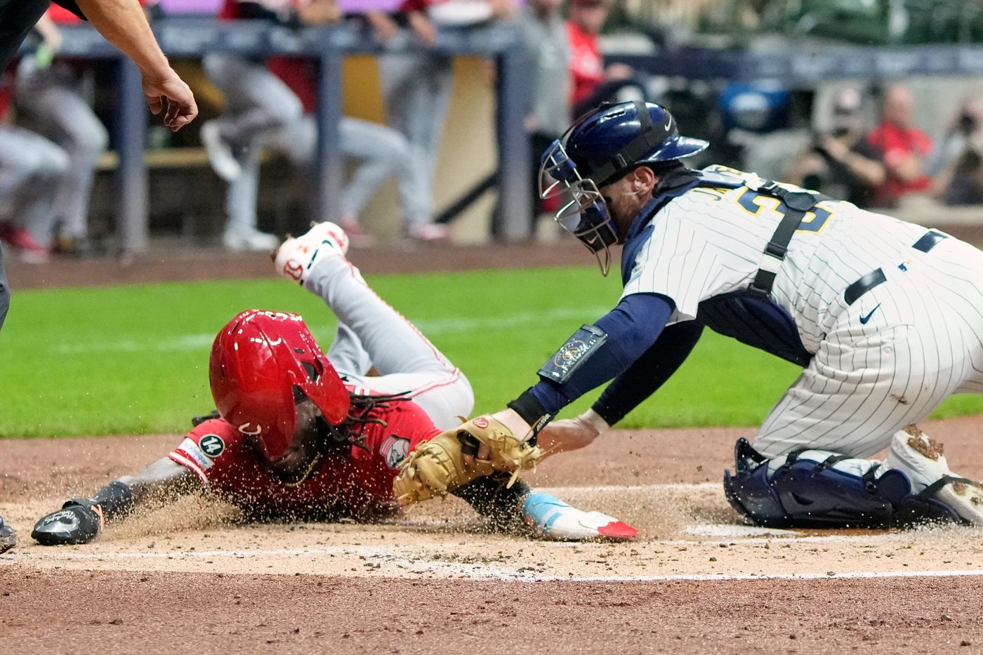 Reds on cusp of playoff berth after beating Brewers 7-4 | iNFOnews.ca