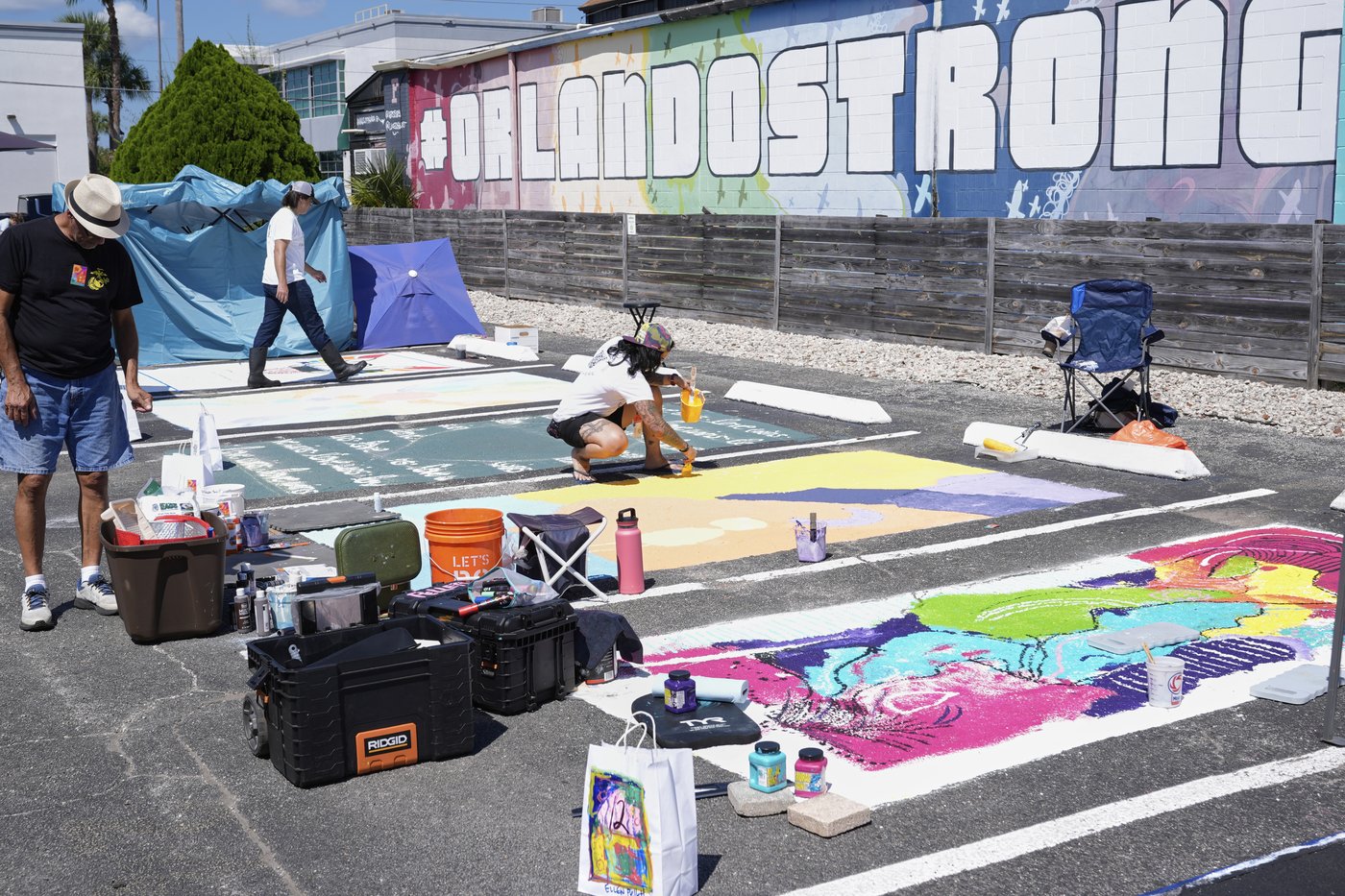 Parking spots used as colorful protest against Florida crackdown on rainbow crosswalks | iNFOnews.ca