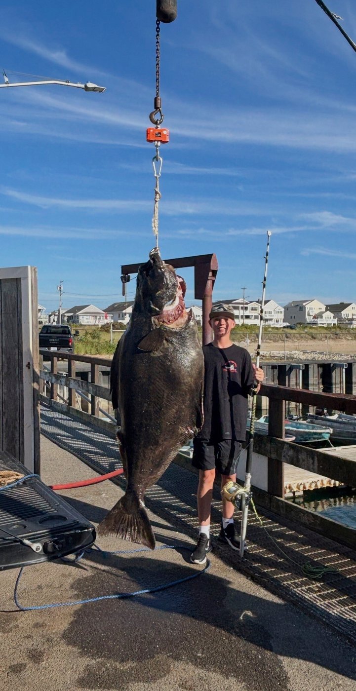 Young man and the sea: Teen fishing off New England coast catches huge halibut bigger than him | iNFOnews.ca