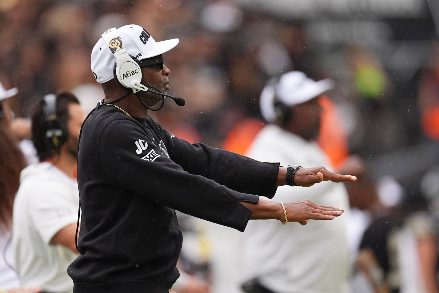 Colorado fans storm field after win over No. 22 Iowa State, Deion Sanders loves it but fine may loom | iNFOnews.ca
