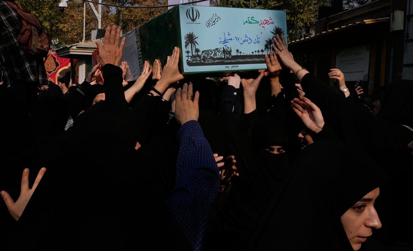 Photos show mourners in Tehran honoring the unknown soldiers killed in the 1980's Iran-Iraq war | iNFOnews.ca