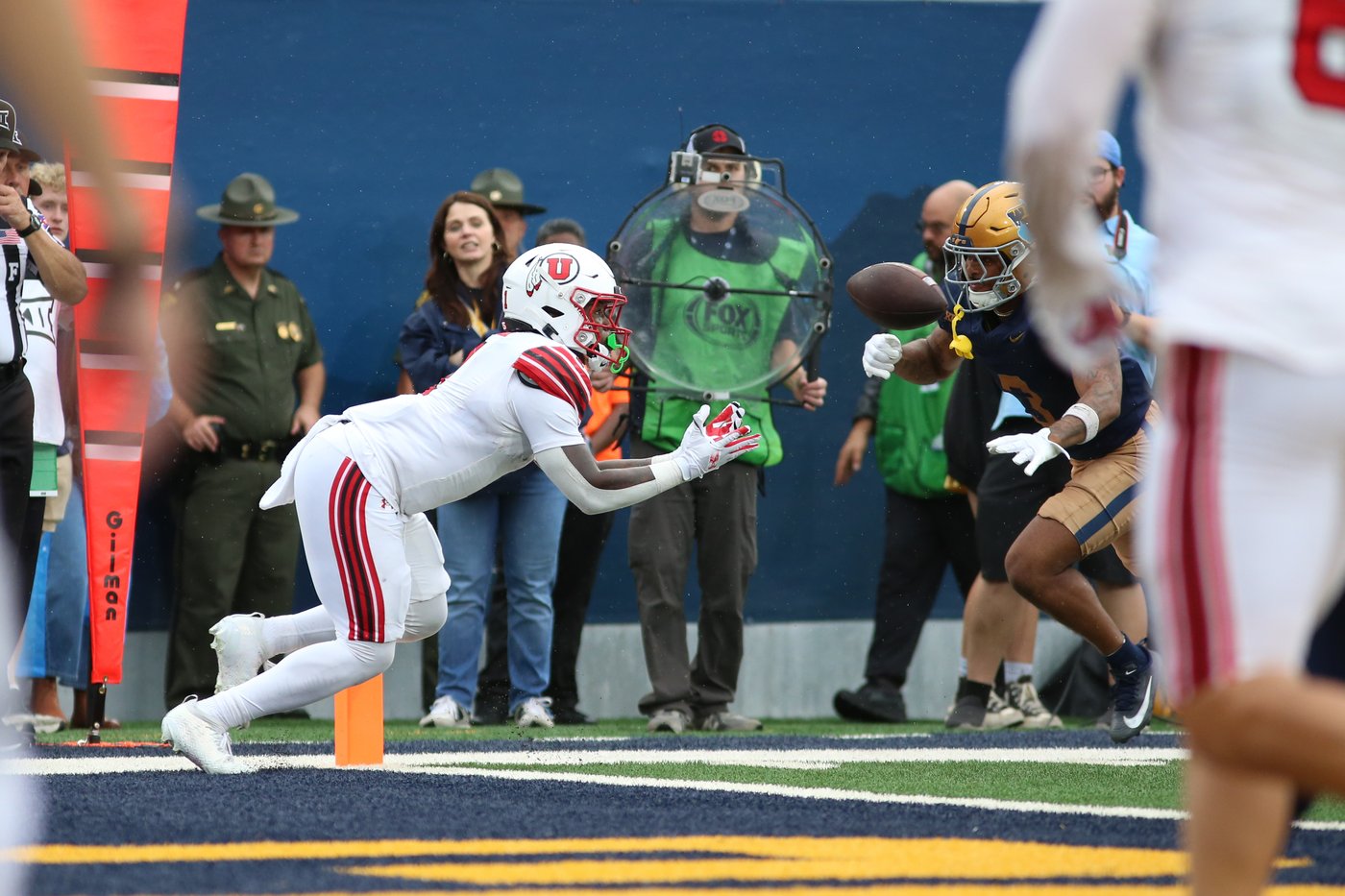 Dampier throws career-high 4 TD passes, runs for a score and Utah beats West Virginia 48-14 | iNFOnews.ca