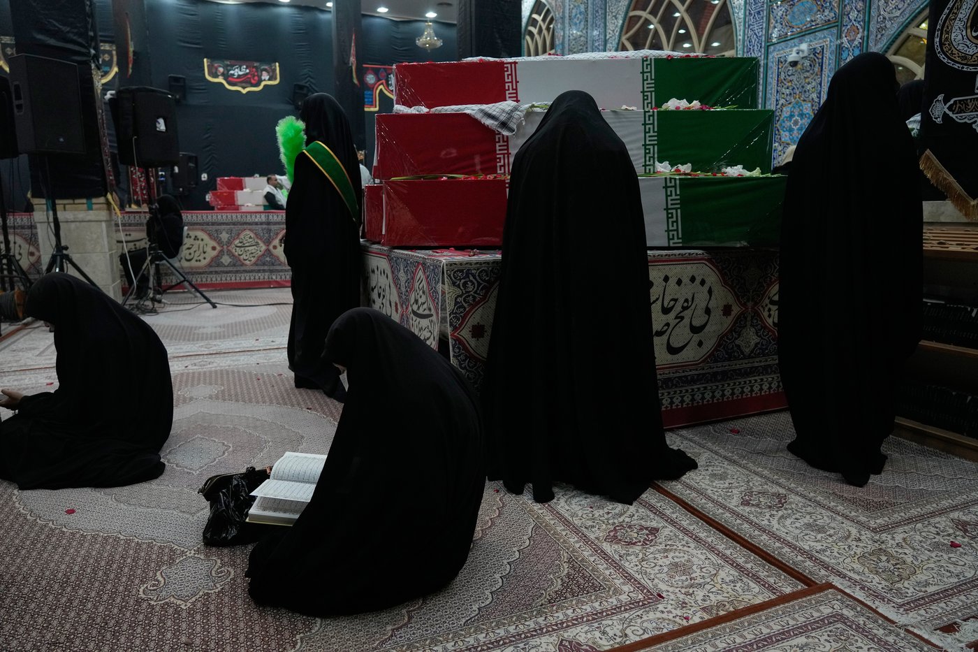 Photos show mourners in Tehran honoring the unknown soldiers killed in the 1980's Iran-Iraq war | iNFOnews.ca