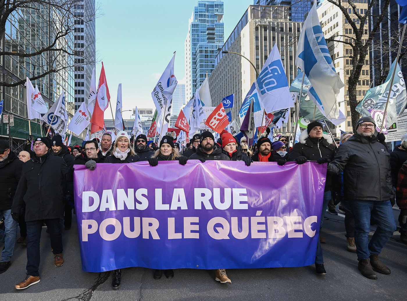 Unions, community groups rally in Montreal against Quebec government policies | iNFOnews.ca