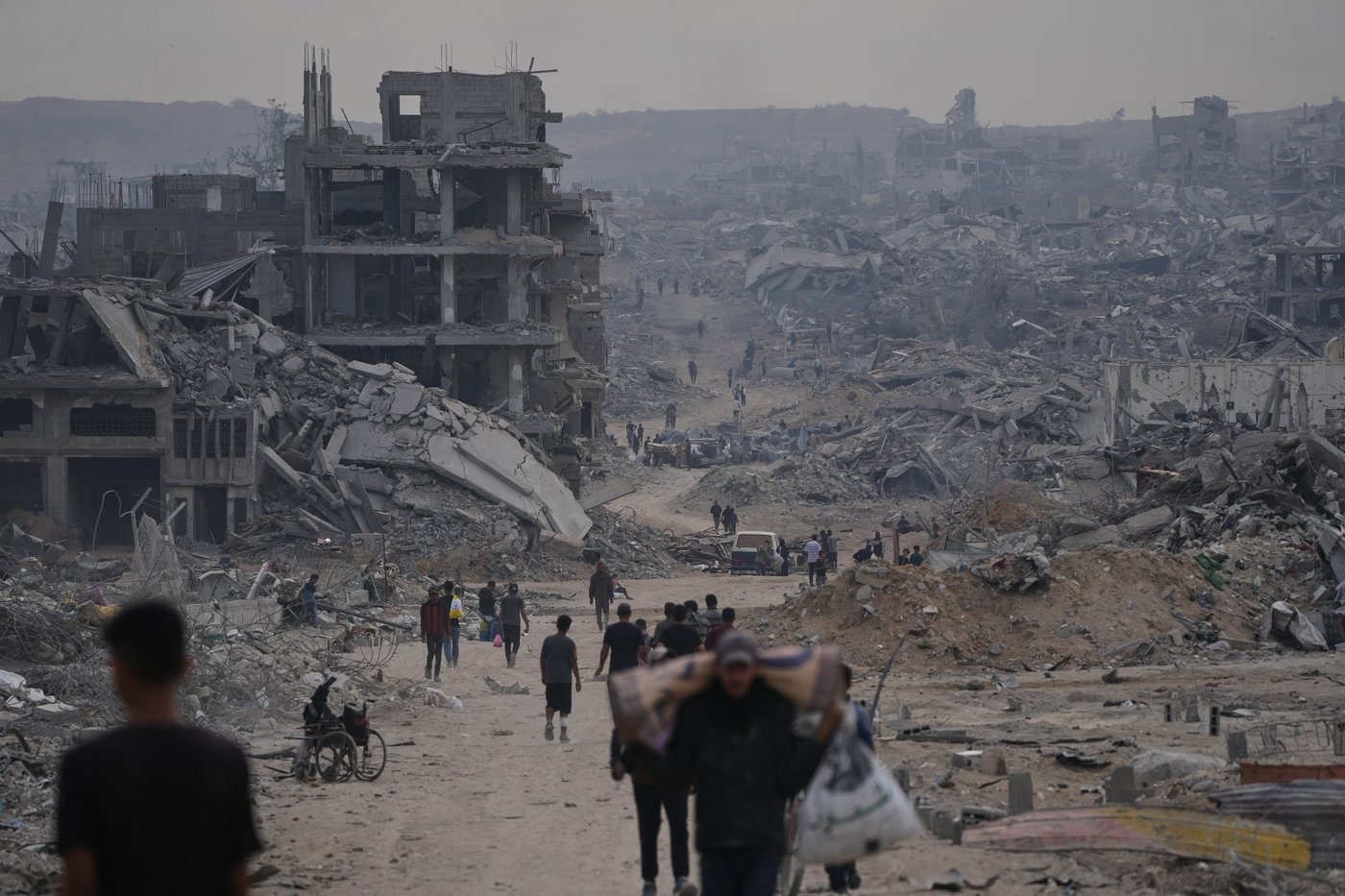The Latest: Palestinians journey back home as aid convoys start to enter Gaza | iNFOnews.ca