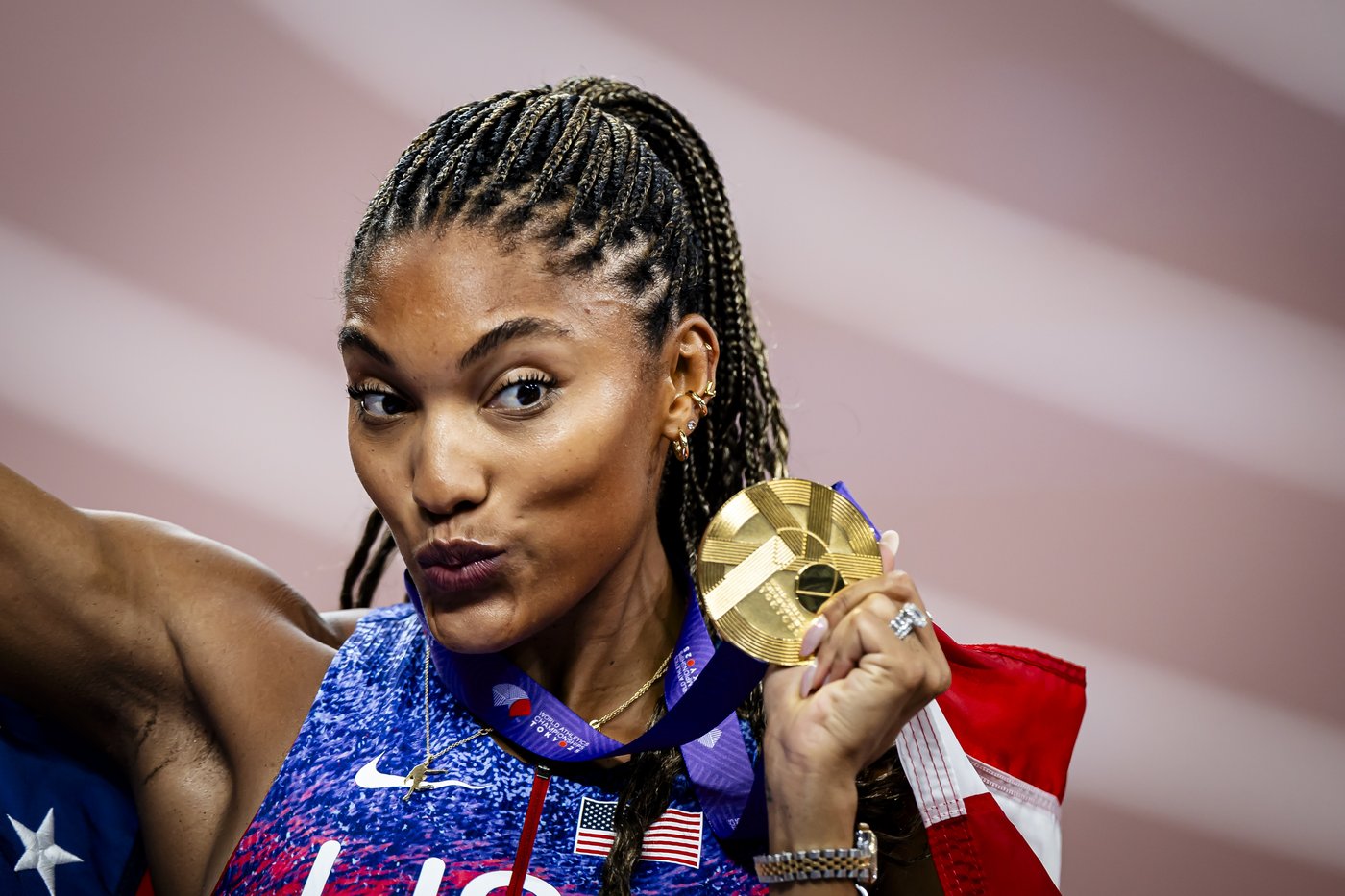 Long jumper Tara Davis-Woodhall explains tears during national anthem: 'I do believe in my country' | iNFOnews.ca