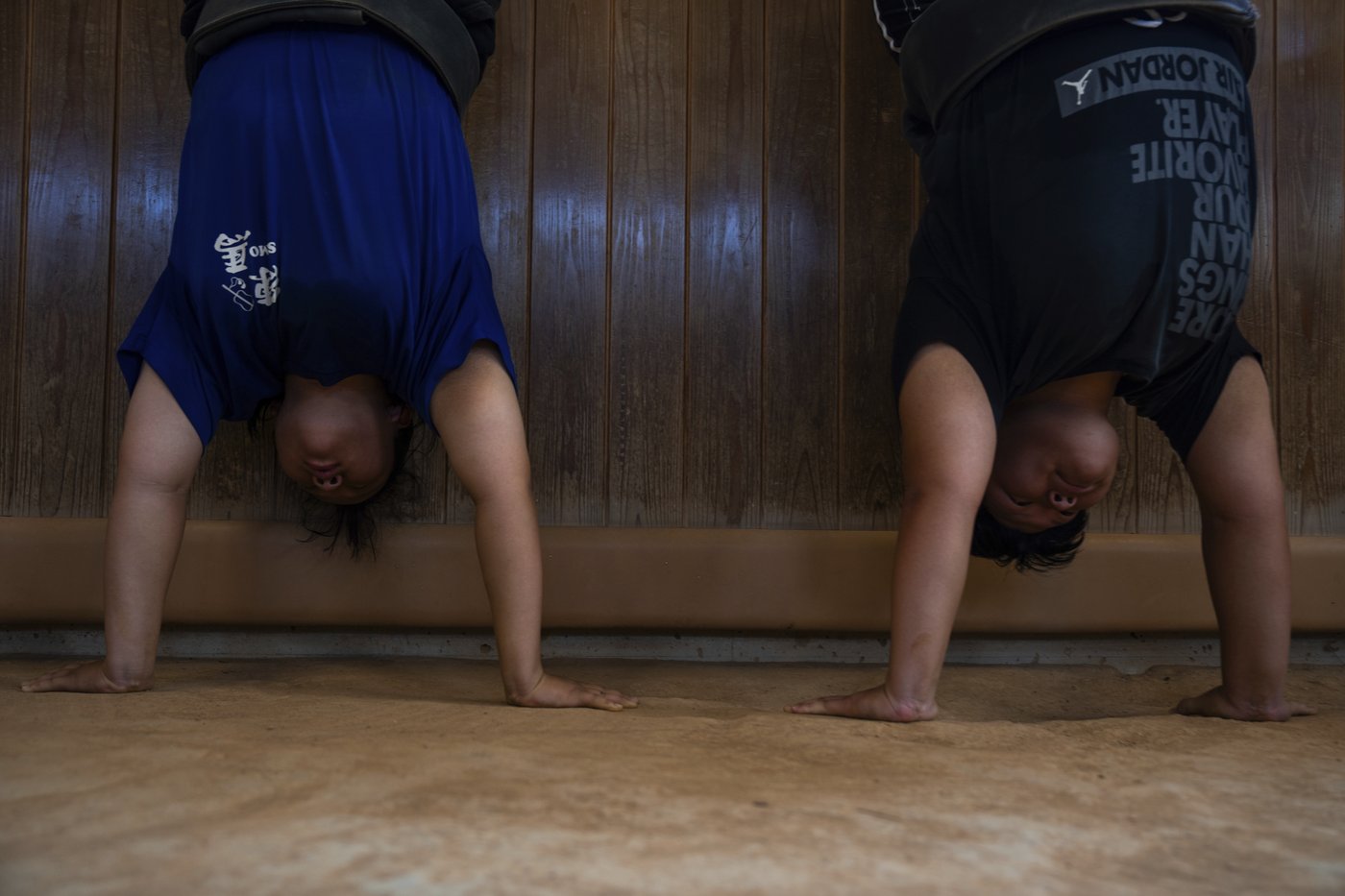 Photos show women in Japan working to break down barriers in ancient, tradition-bound sumo | iNFOnews.ca