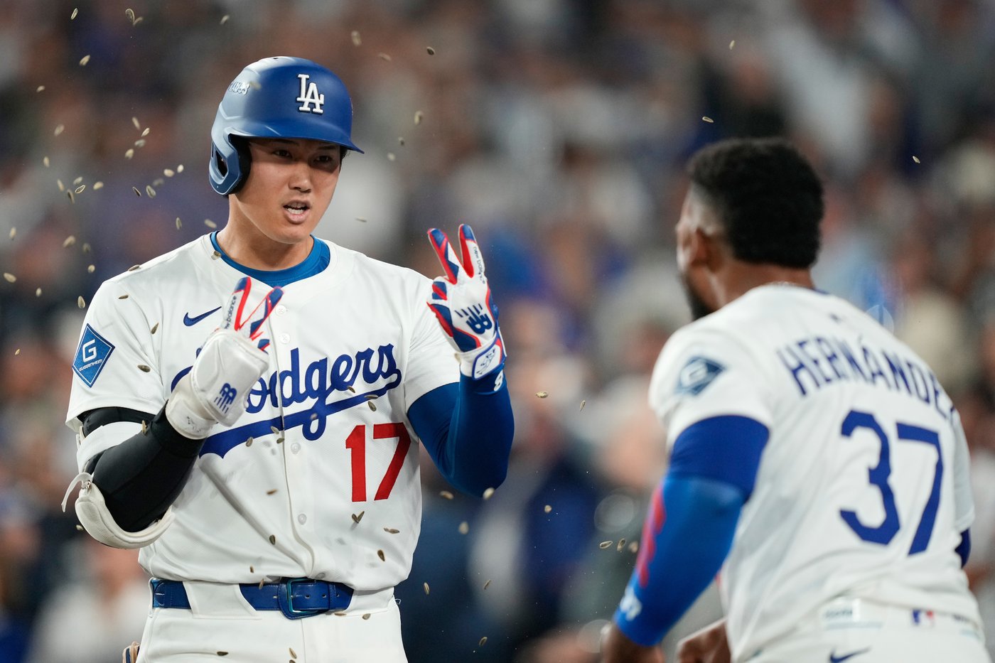 Ohtani hits 2 homers for Dodgers in playoff opener against Reds | iNFOnews.ca