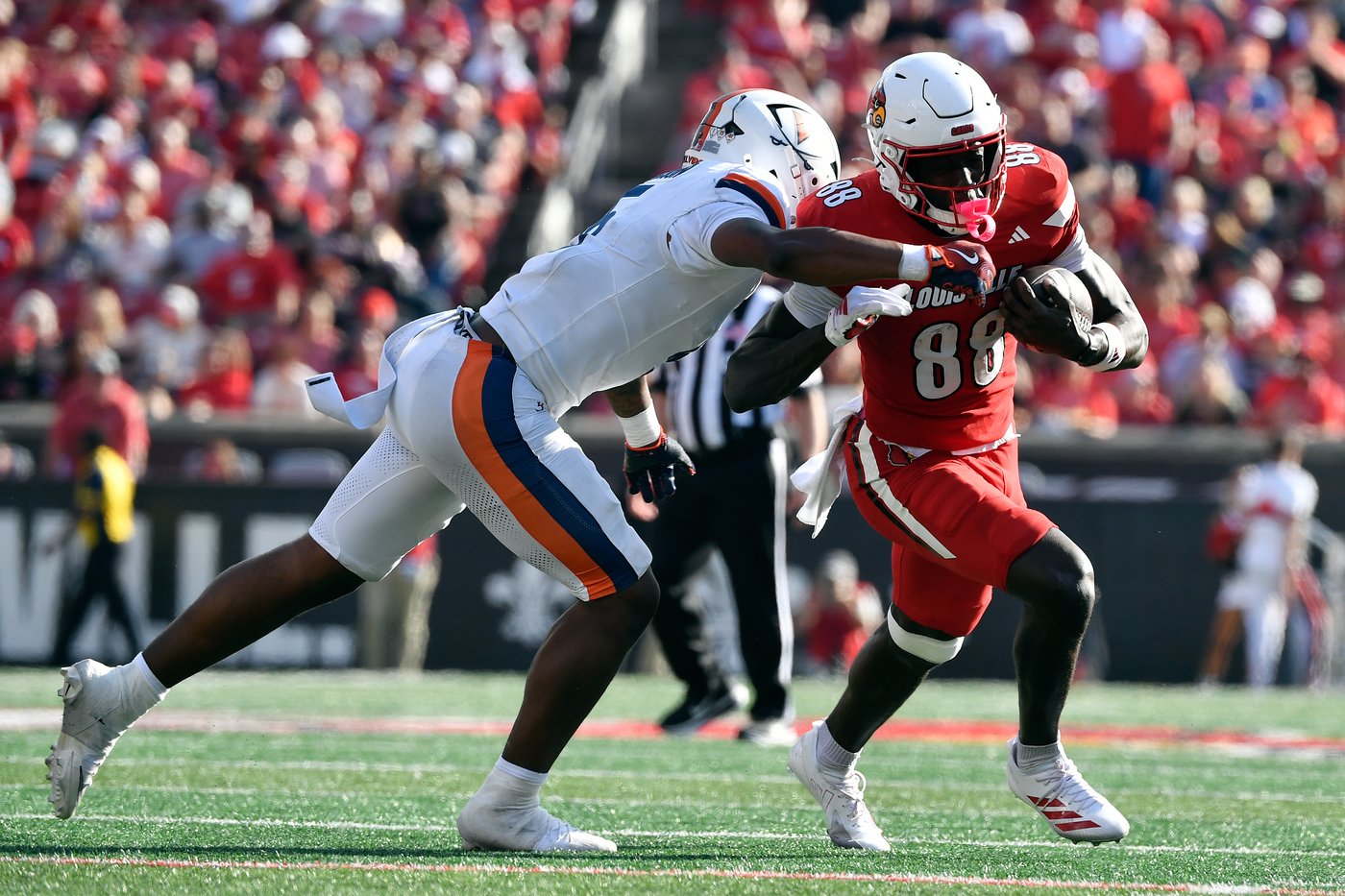 Taylor's OT run lifts No. 24 Virginia to a 30-27 victory over Louisville | iNFOnews.ca