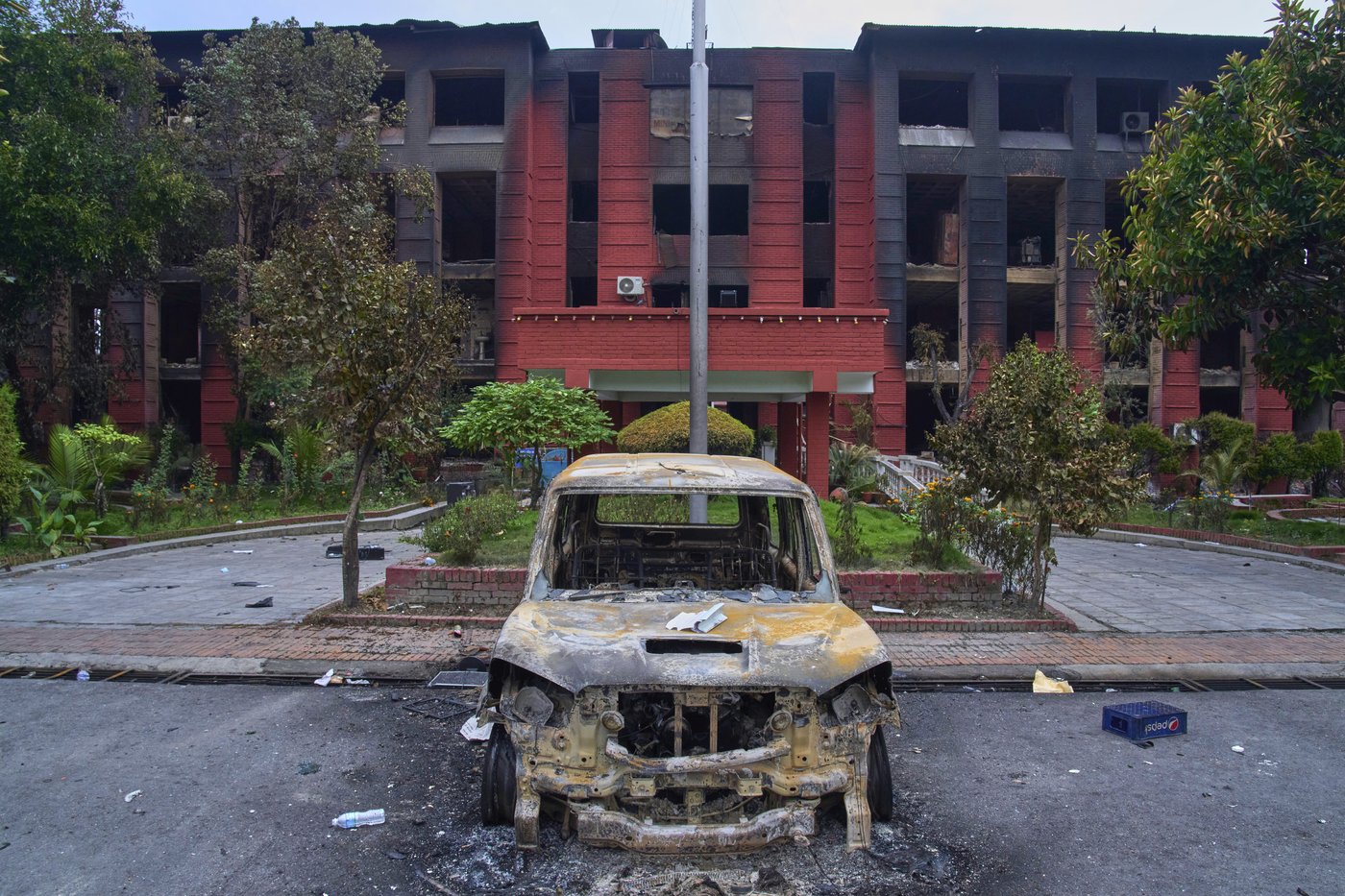 Photos show violent protests in Nepal, with government buildings set on fire | iNFOnews.ca