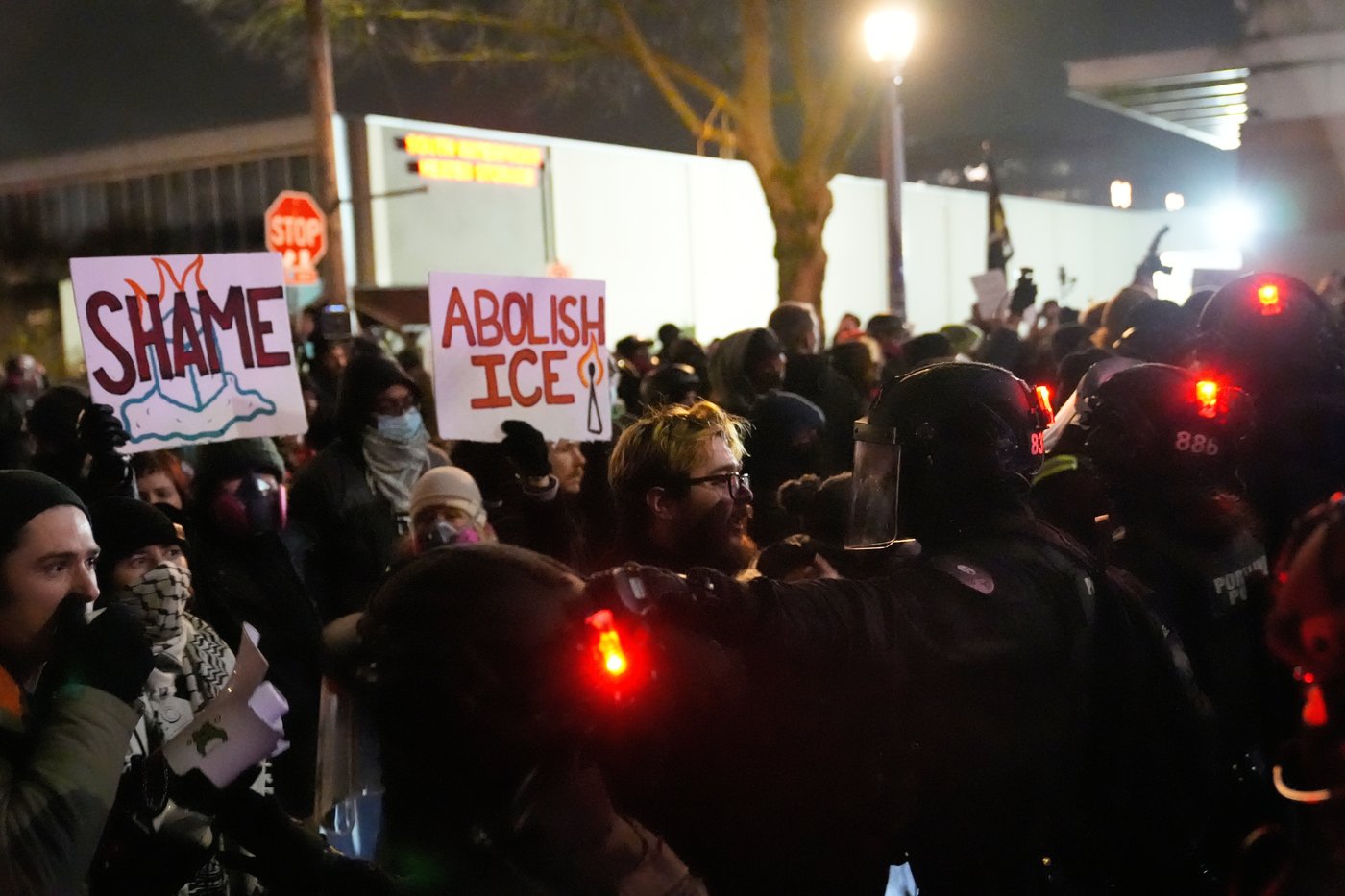 Photos show protests over the shooting of 2 people by federal immigration agents in Oregon | iNFOnews.ca