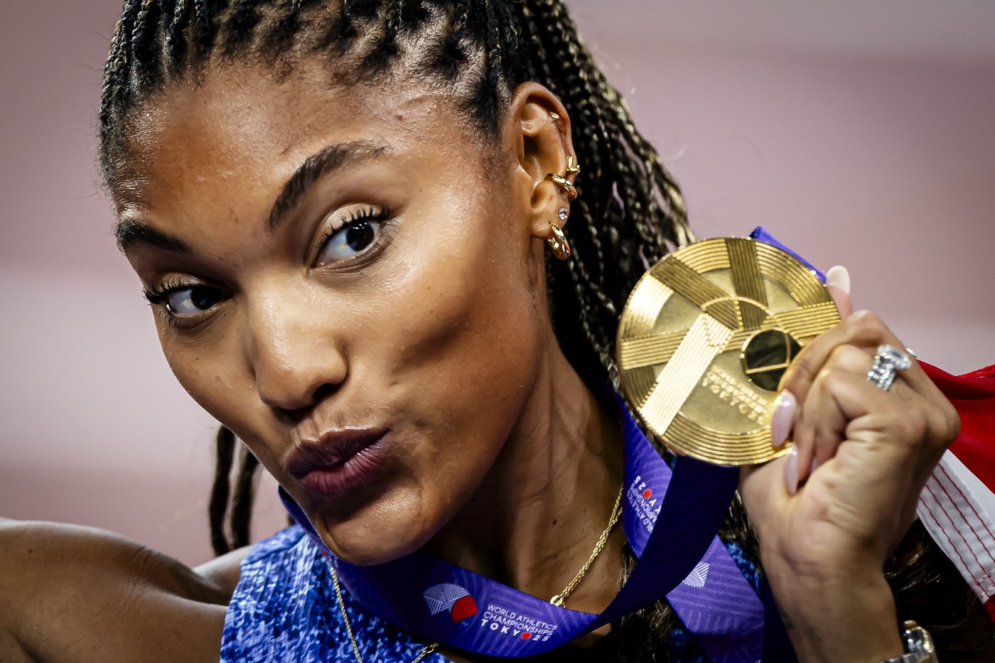Long jumper Tara Davis-Woodhall explains tears during national anthem: 'I do believe in my country' | iNFOnews.ca