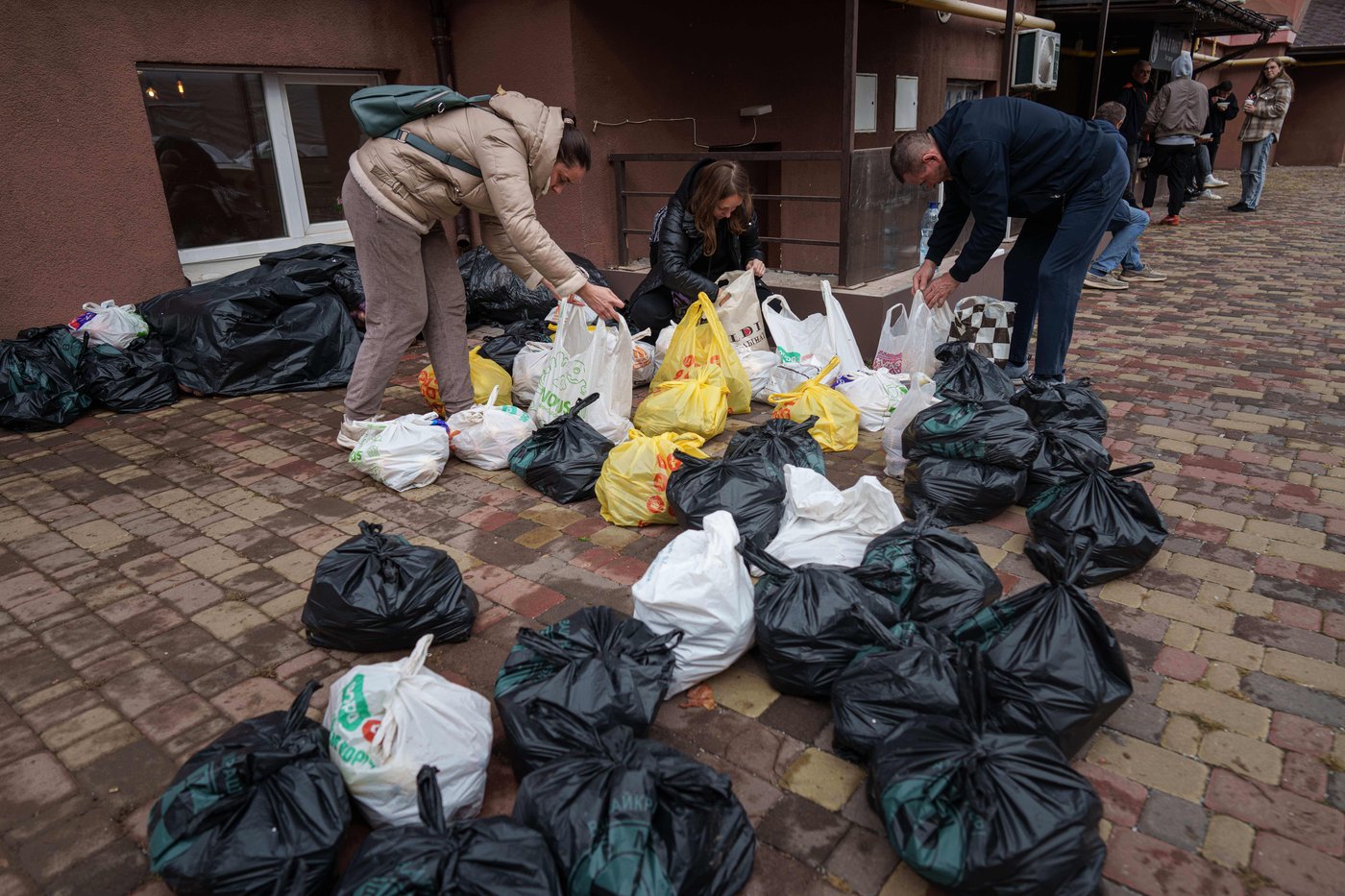 After missile strike near Kyiv, volunteers and one café owner help stitch life back together | iNFOnews.ca