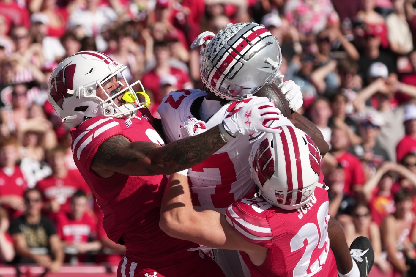 Sayin throws 4 TD passes as No. 1 Ohio State throttles Wisconsin 34-0 | iNFOnews.ca Sayin throws 4 TD passes as No. 1 Ohio State throttles Wisconsin 34-0 | iNFOnews.ca