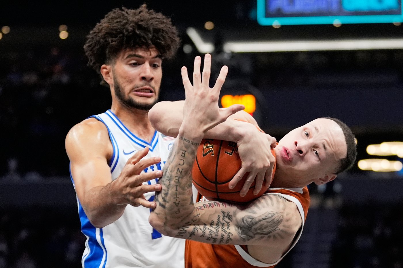 Evans, Boozer help No. 6 Duke overcome slow start and defeat Texas 75-60 in season opener | iNFOnews.ca Evans, Boozer help No. 6 Duke overcome slow start and defeat Texas 75-60 in season opener | iNFOnews.ca