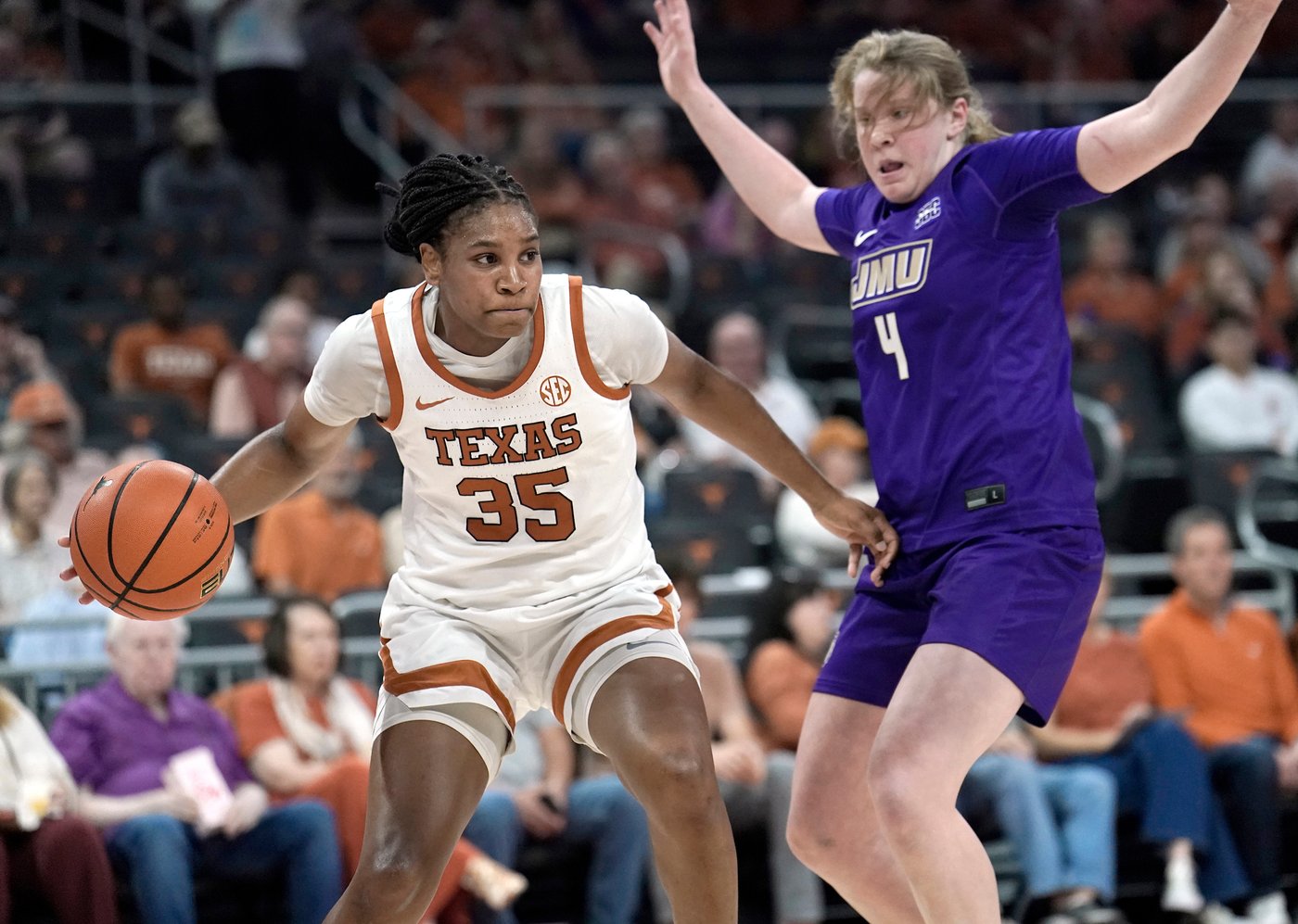 Booker's all-around performance leads No. 4 Texas to a 95-56 win against James Madison | iNFOnews.ca
