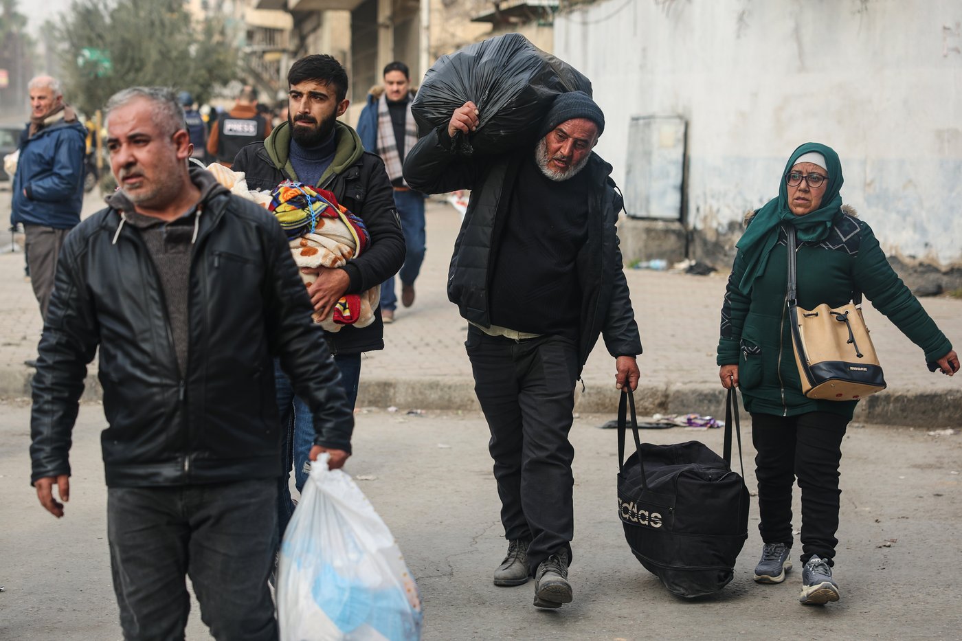 Photos of Syrians fleeing violence in Aleppo | iNFOnews.ca