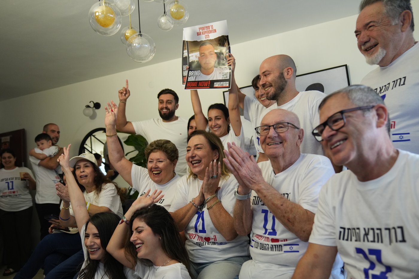 Israelis celebrate the return of hostages after ceasefire in Gaza, in photos | iNFOnews.ca