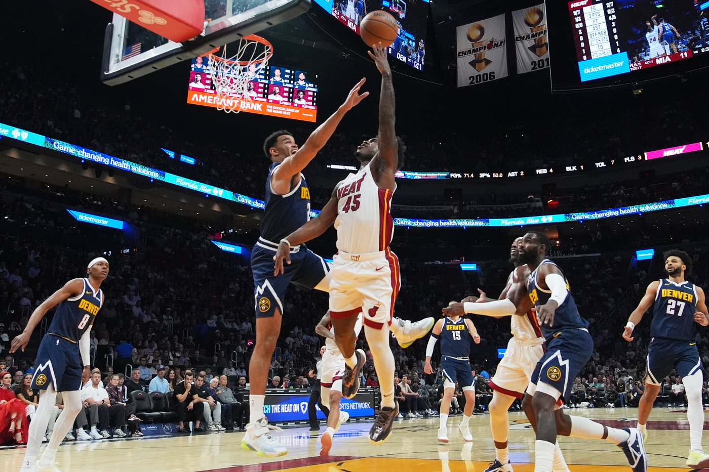 Jokic gets hurt late in 1st half, Heat pull away from there to top Nuggets | iNFOnews.ca